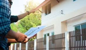 How to Buy Property Safely in Pakistan 2026 – buyer inspecting property on site visit